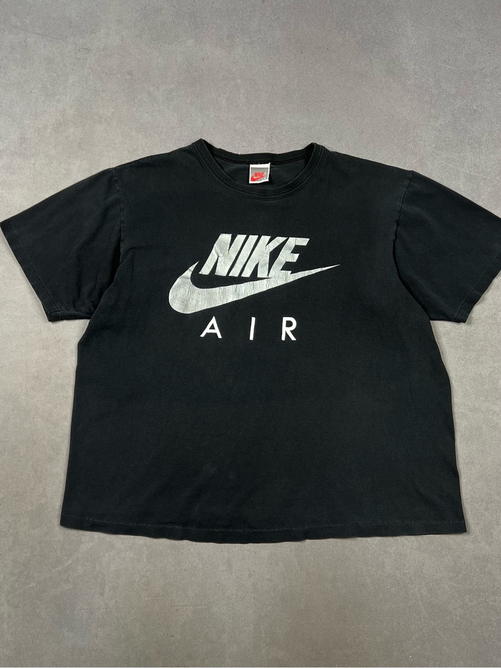 Vintage Nike Black Tee with Red Swoosh